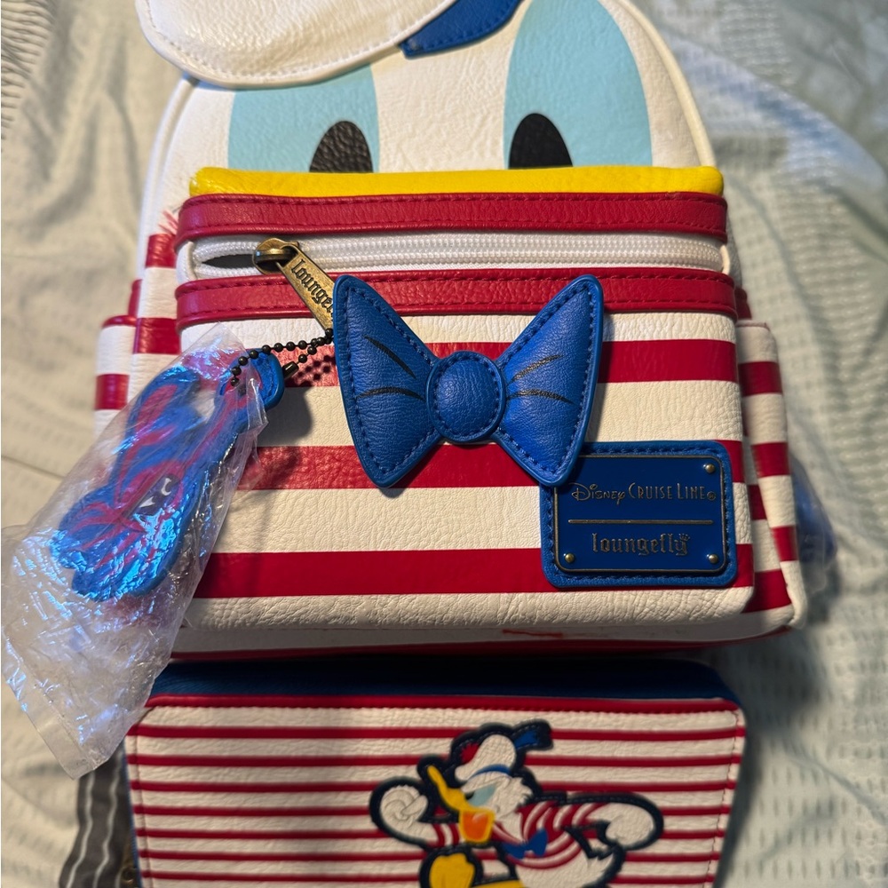 Loungefly Disney Donald Duck Striped Backpack w/matching wallet. New, never used